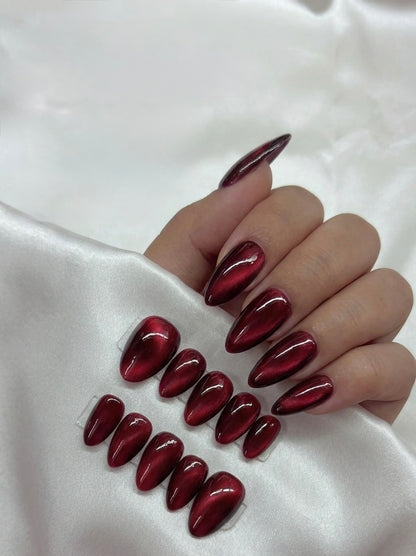 Red Cateye Swirl Nails
