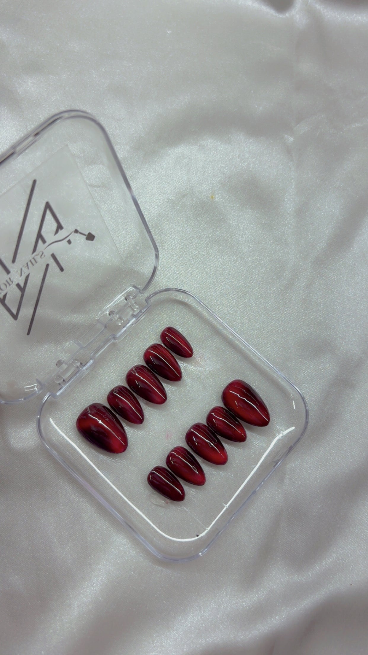 Red Cateye Swirl Nails