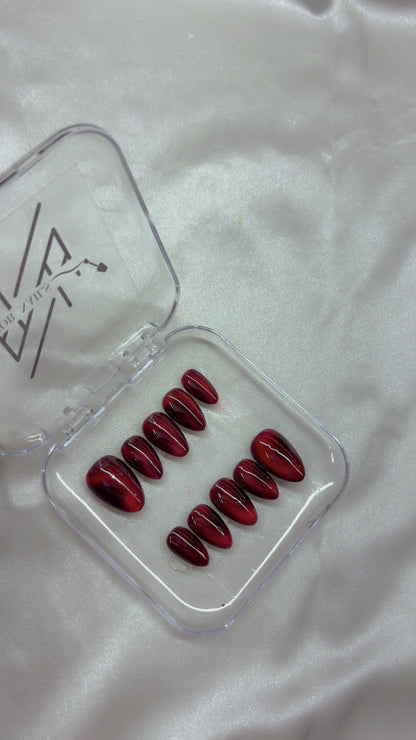 Red Cateye Swirl Nails