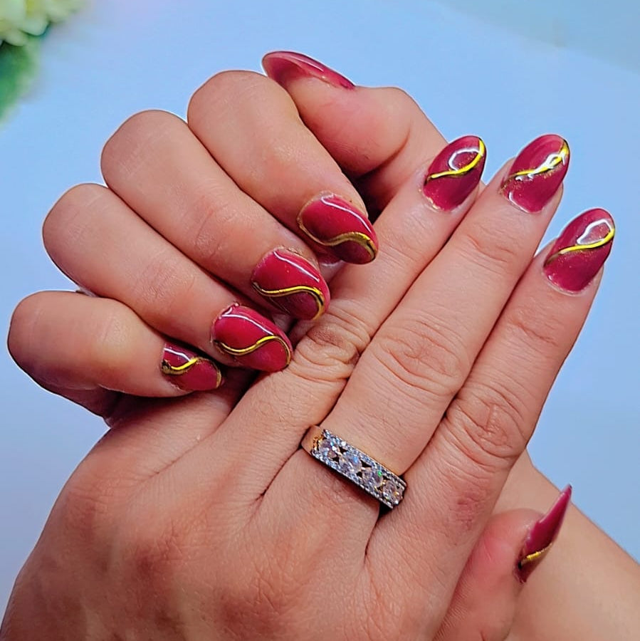 Red + Golden Swirls Nails