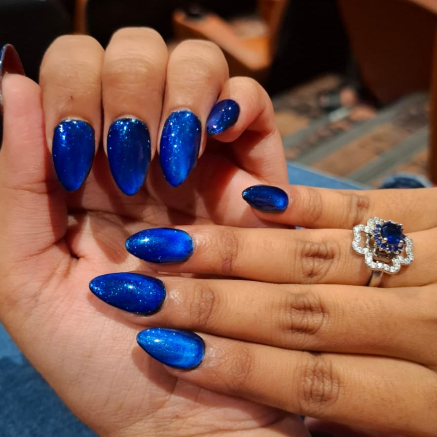 Glitter Blue Cateye Nails
