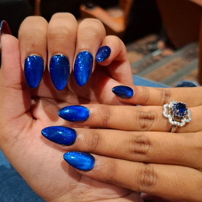 Glitter Blue Cateye Nails