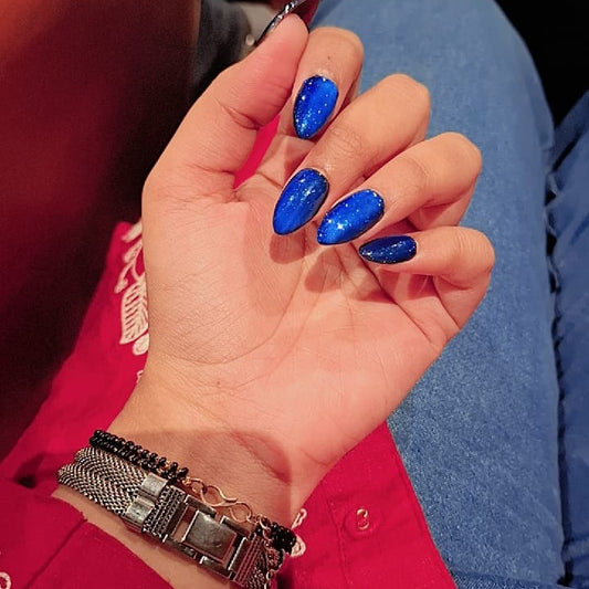 Glitter Blue Cateye Nails