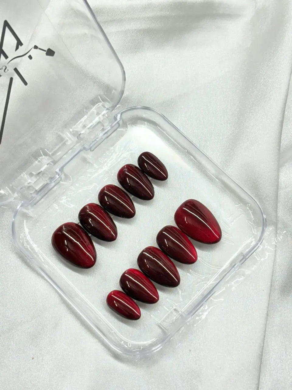Red Cateye Nails Nior Nails